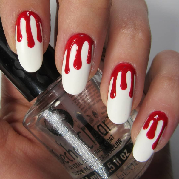 Halloween nail art ideas for 2020 red blood drips on a white background
